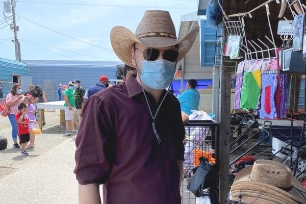 Enrico with mouth guard at a market stall in the USA.