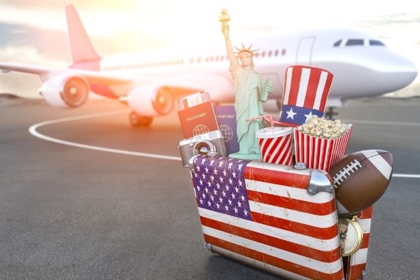 Airplane and suitcase in USA look