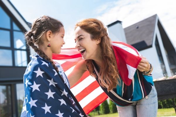 Woman and child with USA flag